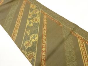 斜線に椿・花唐草模様織出し名古屋帯